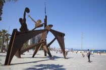 Spain, Catalonia, Barcelona, Playa de St Sebastia, Barceloneta Beach, Plaza del Mar, Swimming Hommage sculpture by Alfredo Lanz.