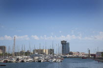 Spain, Catalonia, Barcelona, View across Port Vell with the Cable Car tower visible.