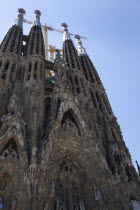 Spain, Catalonia, Barcelona, exterior of La Sagrada Familia, designed by Antoni Gaudi.