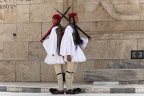Greece, Attica, Athens, Greek soldiers, Evzones, beside Tomb of the Unknown Soldier, outside Parliament building.