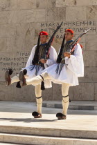 Greece, Attica, Athens, Greek soldiers, Evzones, marching beside Tomb of the Unknown Soldier, outside Parliament building.