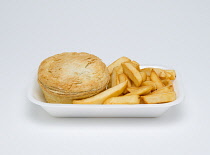 Food, Cooked, Meat, Single meat pie and potato chips in an insulated polystyrene foam tray on a white background.