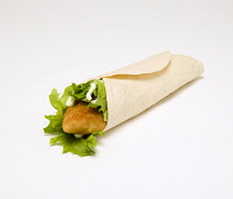 Food, Cooked, Poultry, Chicken wrap with lettuce and mayonaise on a white background.