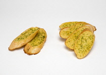 Food, Cooked, Bread, Slices of garlic bread with parsley on a white background.