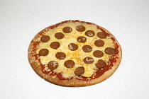 Food, Cooked, Pizza, Whole round pepperoni pizza on a white background.