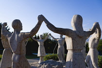 Spain, Catalonia, Barcelona, Stone sculpture on Montjuic depicting the Catalan national dance the Sardana.