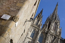 Spain, Catalonia, Barcelona, The spire and main facade of the Cathedral in the Old Town district.