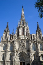 Spain, Catalonia, Barcelona, The spire and main facade of the Cathedral in the Old Town district.