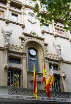 Spain, Catalonia, Barcelona, The theatre Reial Academia de Ciencies i Arts with the city's first official public clock on La Rambla in the Old Town district.