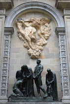 Spain, Catalonia, Barcelona, Bronze Monument to The Heroes of 1809 by Josep Limona in Carrer del Bisbe commemorating the failed revolt against the occupation by France. The alabaster relief above comm...