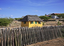 Dutch Antilles, Bonaire, Kradlendijk, Typical house with cactus fence.