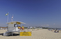 England, Dorset, Poole, Lifeguard Station on Sandbanks Beach.