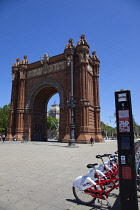 Spain, Catalonia, Barcelona, Parc de la Ciutadella, public hire bicycles next to Arc du Triomf.