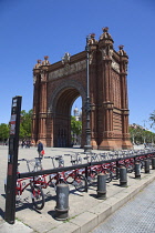 Spain, Catalonia, Barcelona, Parc de la Ciutadella, public hire bicycles next to Arc du Triomf.