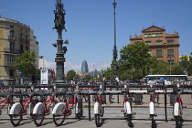 Spain, Catalonia, Barcelona, Parc de la Ciutadella, public hire bicycles next to Arc du Triomf.