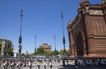 Spain, Catalonia, Barcelona, Parc de la Ciutadella, public hire bicycles next to Arc du Triomf.