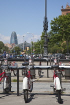 Spain, Catalonia, Barcelona, Parc de la Ciutadella, public hire bicycles next to Arc du Triomf.