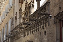 Spain, Catalonia, Barcelona, Gargoyles on a building in the Gothic District.