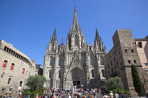 Spain, Catalonia, Barcelona, tourists outside the Cathedral of the Holy Cross and Saint Eulalia.