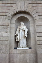 Spain, Catalonia, Barcelona, Statue of Juan Hualler Conseller Il de Barcelona on City Hall, Placa de Sant Jaume in the Gothic Quarter.