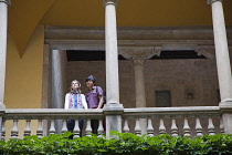 Spain, Catalonia, Barcelona, Tourists in the courtyard of the Crown of Aragon archive building.