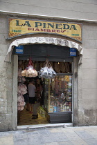 Spain, Catalonia, Barcelona, La Pineda Xarcuteria in the Gothic Quarter.