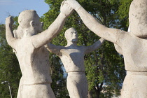 Spain, Catalonia, Barcelona, Monumento a la Sardana stone sculpture in Parc de Montjuic depicting the Catalan national dance.