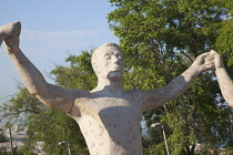 Spain, Catalonia, Barcelona, Monumento a la Sardana stone sculpture in Parc de Montjuic depicting the Catalan national dance.