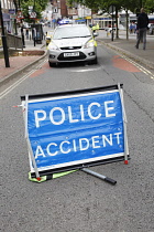 England, West Sussex, East Grinstead, Police attending the scene of a traffic accident.