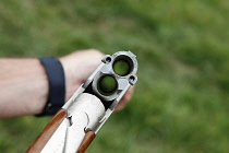 Sport, Shooting, Clay pigeon, close up of empty shotgun barrels.