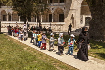 Turkey, Istanbul, Muslim children visiting Suleymaniye Mosque.