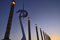 Spain, Catalunya, Barcelona, Montjuic, Torre Calatrava or Torre Telefonica at dusk, Communications Tower completed in 1992 for the Olympic Games.