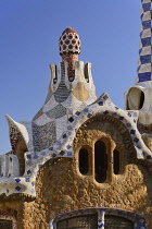 Spain, Catalunya, Barcelona, Parc Guell by Antoni Gaudi, roof detail of the Administration Lodge at the park's entrance.