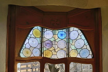 Spain, Catalunya, Barcelona, Casa Batllo by Antoni Gaudi, detail of window in the interior.