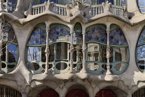 Spain, Catalunya, Barcelona, Casa Batllo by Antoni Gaudi, detail of window exterior.