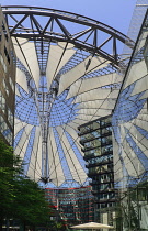 Germany, Berlin, Potzdamer Platz, Sony Centre with glass canopied roof over its central plaza.