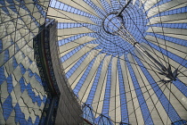 Germany, Berlin, Potzdamer Platz, Sony Centre with glass canopied roof over its central plaza.