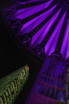 Germany, Berlin, Potzdamer Platz, Sony Centre with a section of its glass canopied roof and the nearby Bahn Tower.