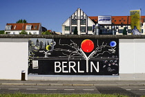 Germany, Berlin, The East Side Gallery, a 1.3  km long section of the Berlin Wall, mural with the word Berlin prominently displayed.