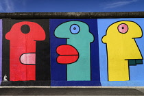 Germany, Berlin, The East Side Gallery, a 1.3  km long section of the Berlin Wall, Mural called Homage to the Young Generation by Thierry Noir.