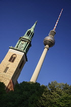 Germany, Berlin, Fernsehturm, Berlin's TV Tower overlooking Marienkirche also known as St Marys Church.