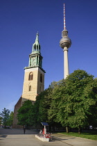 Germany, Berlin, Fernsehturm, Berlin's TV Tower overlooking Marienkirche also known as St Marys Church.