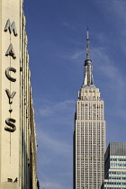 USA, New York, Empire State Building from 34th Street with Macys sign.