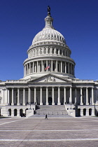 USA, Washington DC, Capitol Building, Head on view of the central section with its dome and American flag at half mast.