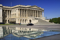 USA, Washington DC, Capitol Building, The House of Representatives reflected in the Capitol Visitor Centre roof.