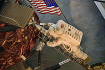 USA, Washington DC, National Mall, National Air and Space Museum, Lunar module with astronaut figure climbing the steps.