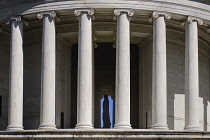 USA, Washington DC, National Mall, Thomas Jefferson Memorial, Close up view from west side with staue of Jefferson visible through the building's Ionic columns.