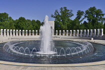 USA, Washington DC, National Mall, National World War 2 Memorial, Plaza with fountains and granite pillars.