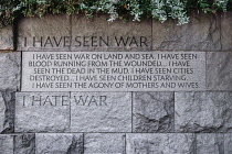 USA, Washington DC, National Mall, President Franklin Delano Roosevelt Memorial, Mural with inscription detailing the former President's feelings about war.