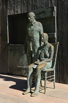 USA, Washington DC, National Mall, President Franklin Delano Roosevelt Memorial, Statues of two people in a scene known as The Rural Couple.